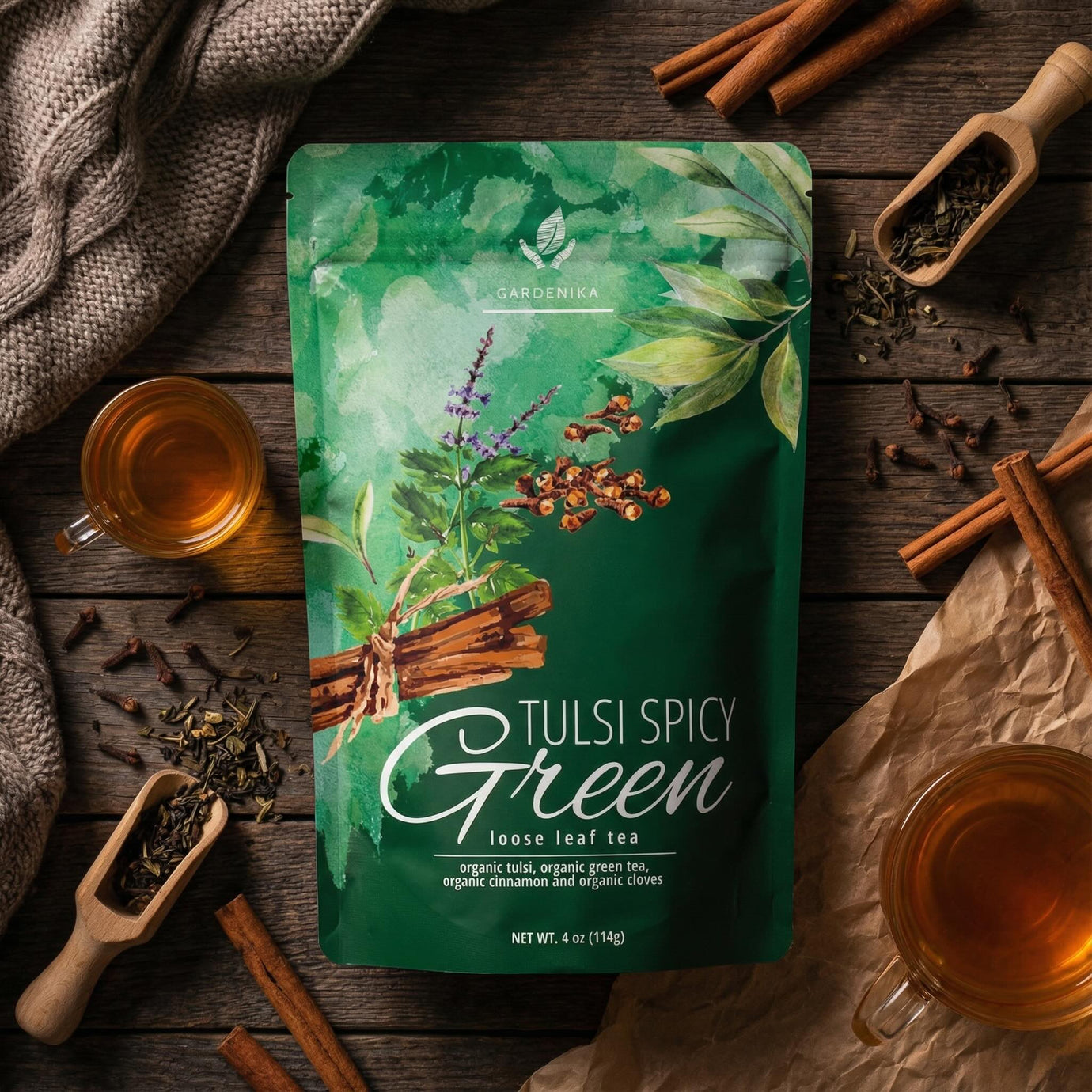 Gardenika Tulsi Spicy Green Chai tea featuring organic green tea and warming chai spices in loose leaf form